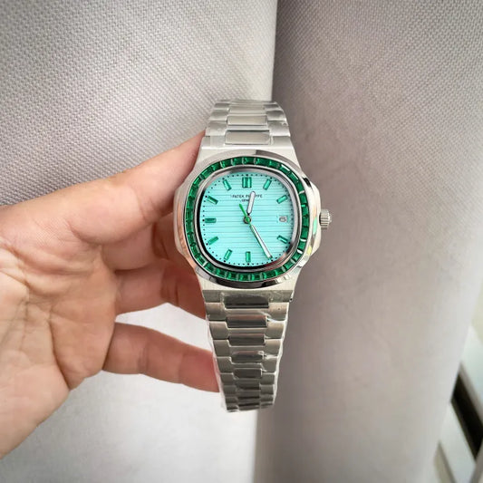 Patek Philippe men's watch with tiffany face and baguette stones,