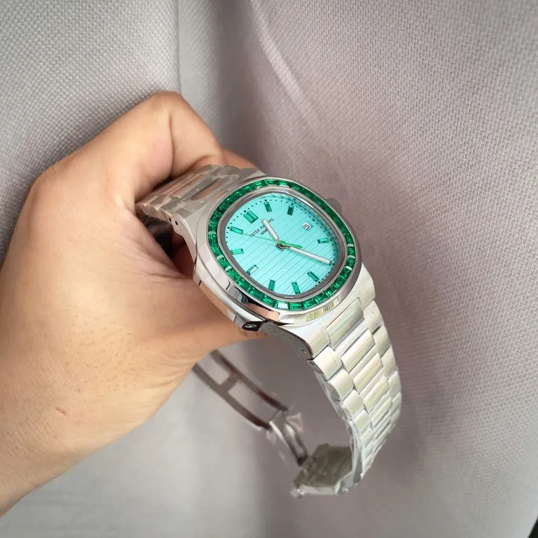 Patek Philippe men's watch with tiffany face and baguette stones,