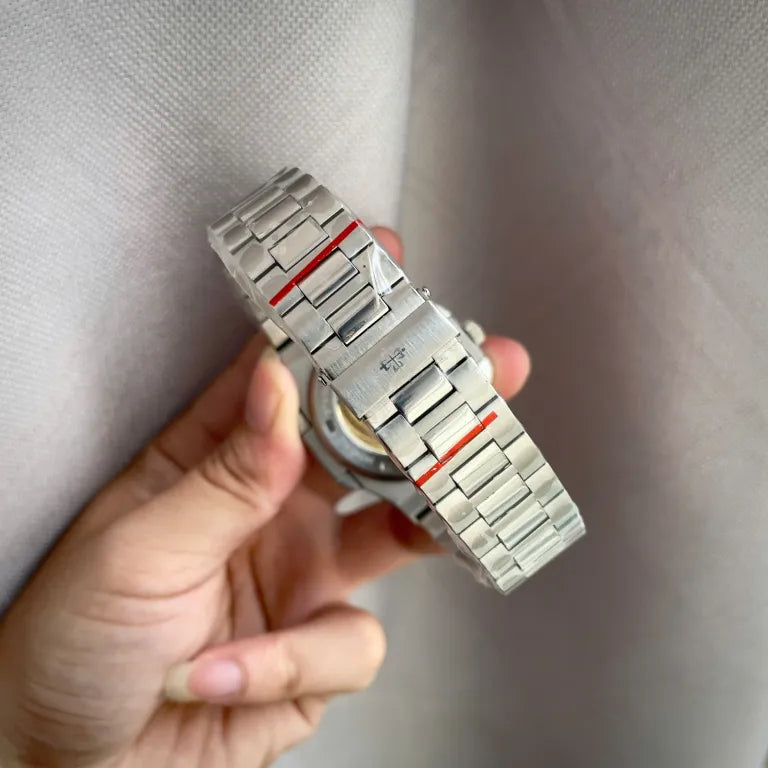 Patek Philippe men's watch with tiffany face and baguette stones,