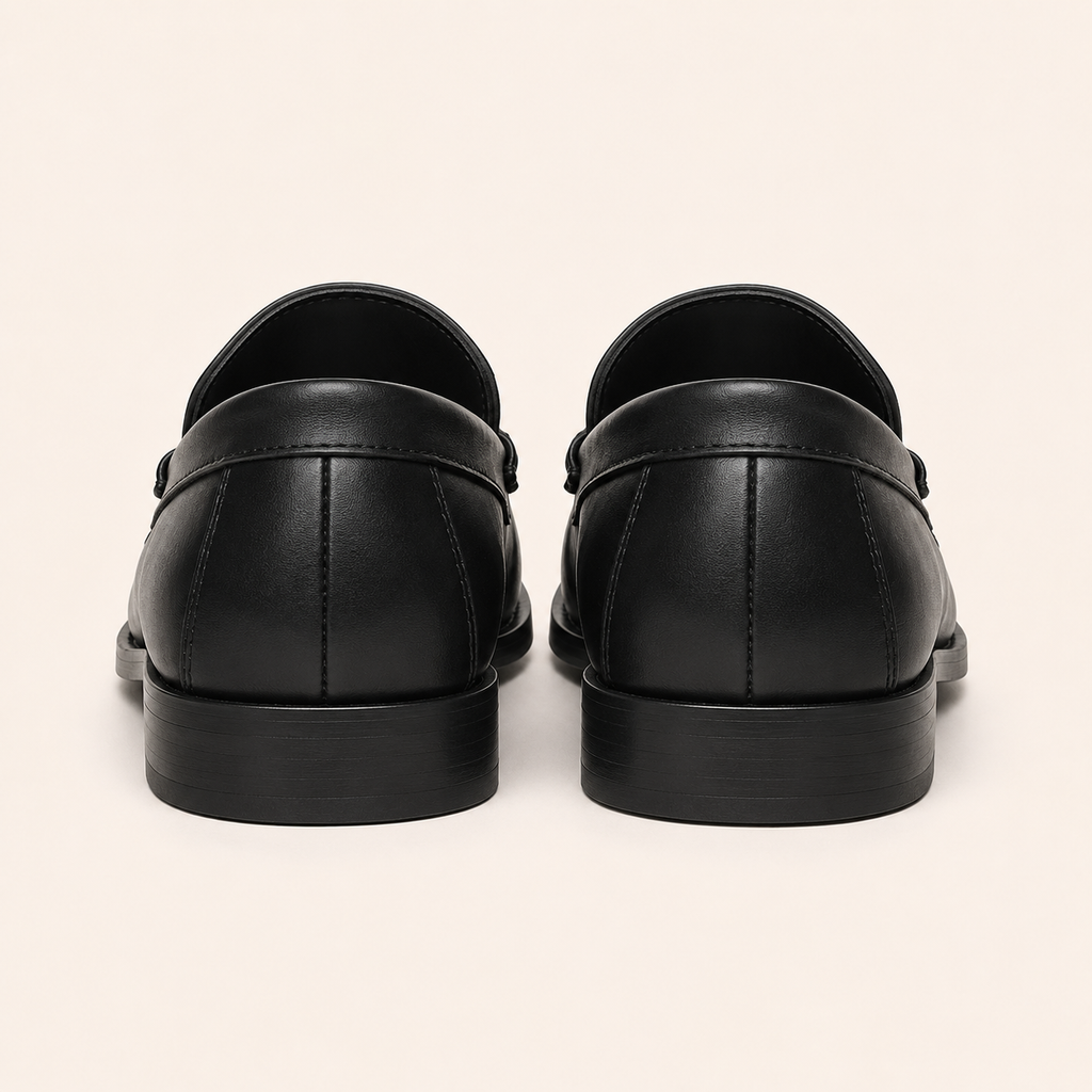 A Classic Men's Black Leather Penny Loafers with Patterned Fabric Vamp