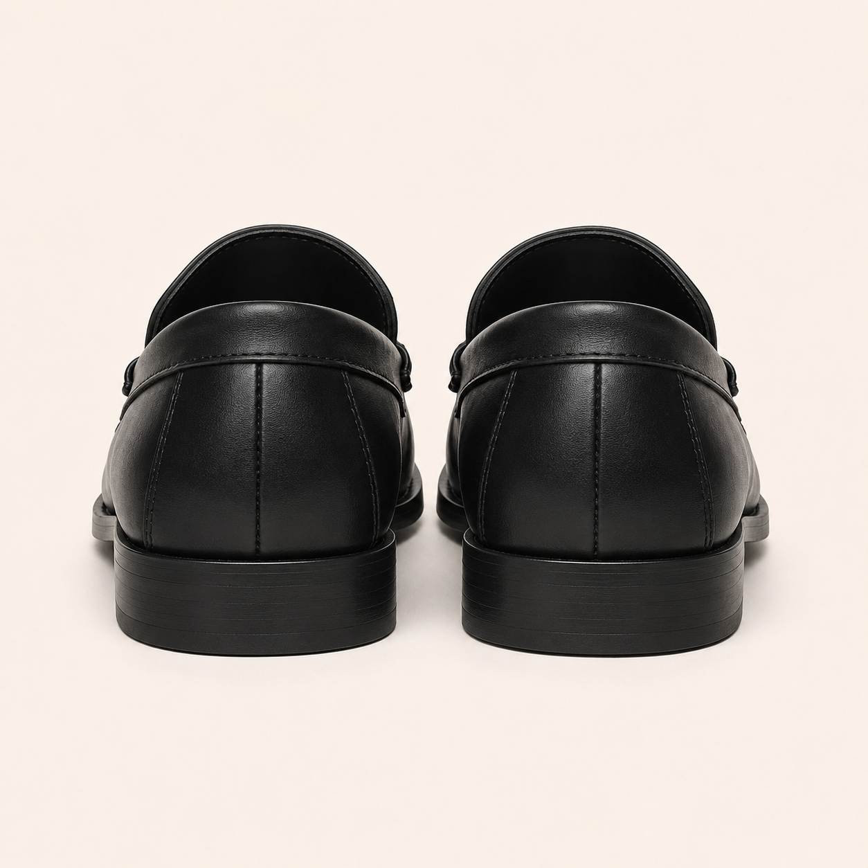A Classic Men's Black Leather Penny Loafers with Patterned Fabric Vamp